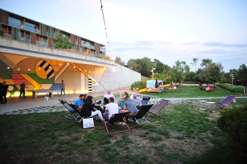 Corporate event team connecting outdoors at a venue in Spain after a wellness activity session