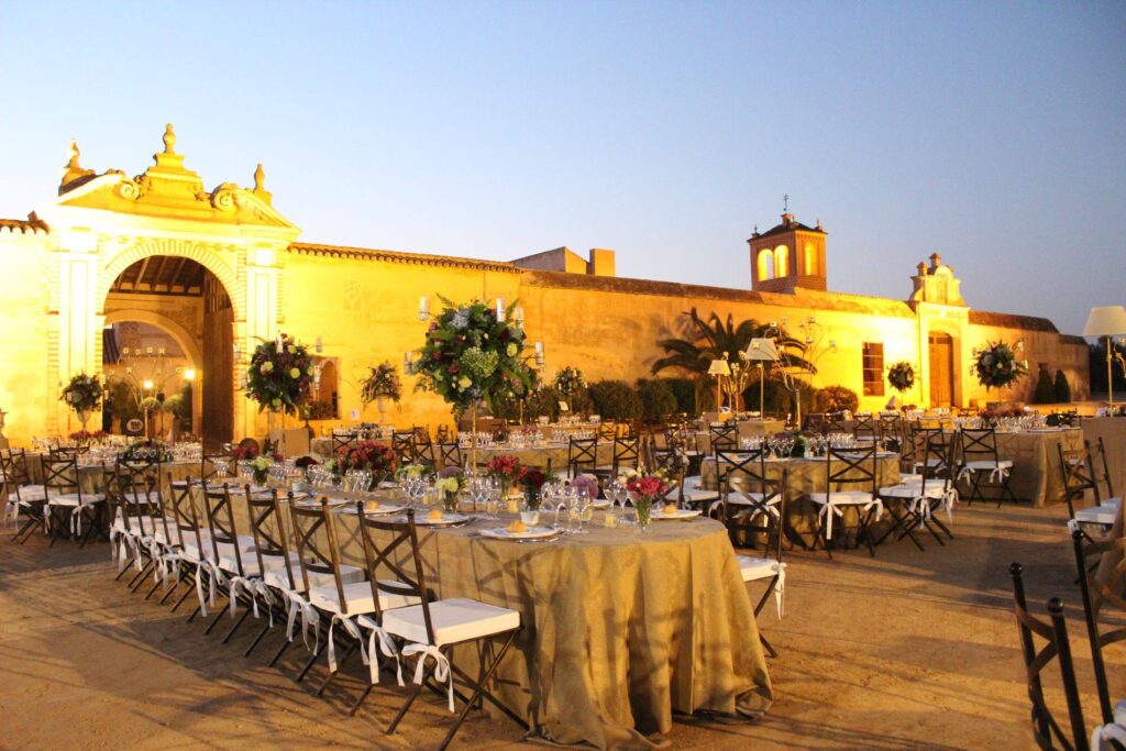 Corporate events in Seville: elegant evening reception in a historic Andalusian courtyard