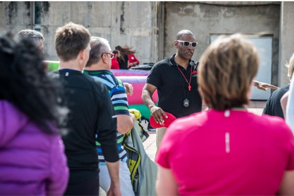 Crossover team facilitator coordinating logistics onsite