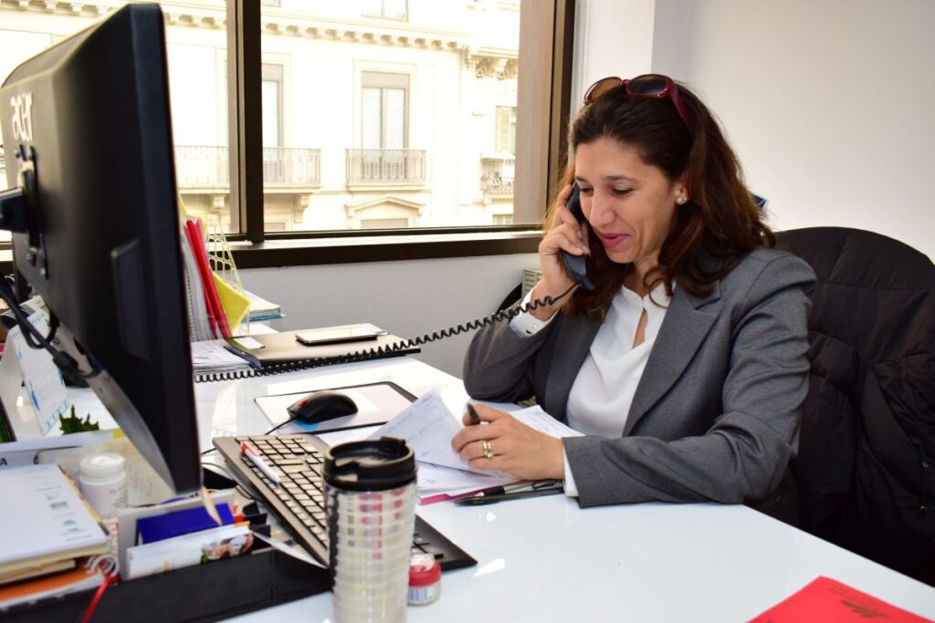 Crossover team member engaging in a follow up conversation to revise program with aa client as a dedicated destination management company standard procedure