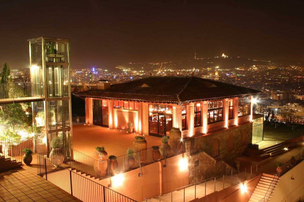 Hilltop gala dinner venue with views over Barcelona at nght