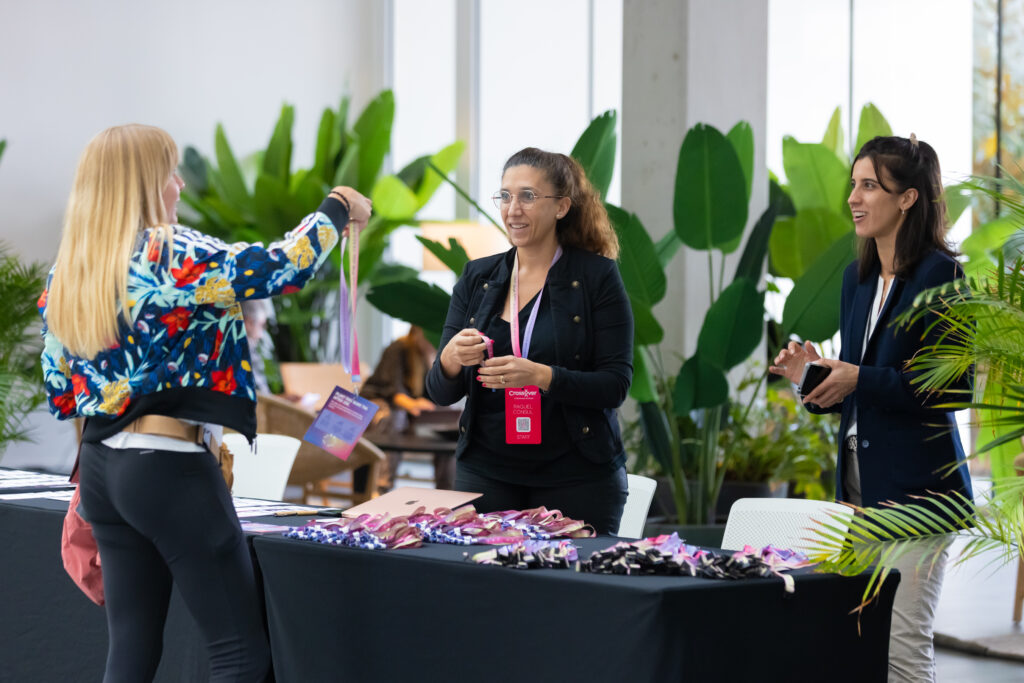 Crossover Events staff managing guest accreditation and welcome desk at the annual meeting near Barcelona
