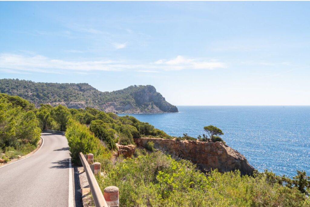Winding coastal road used for private transfers to corporate event venues in Ibiza