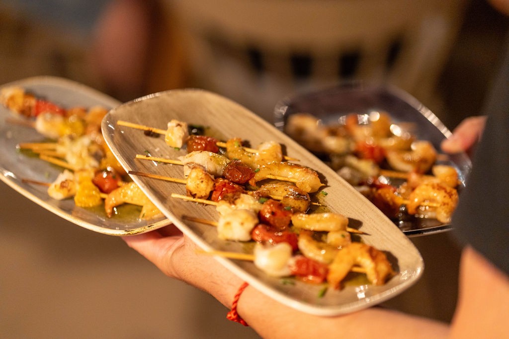 Local and seasonal catering spread at a sustainable corporate event in Spain